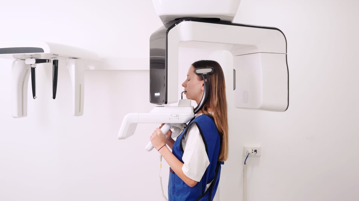 Patient undergoing advanced panoramic X-ray diagnostics at Picasso Dental Clinic Da Nang